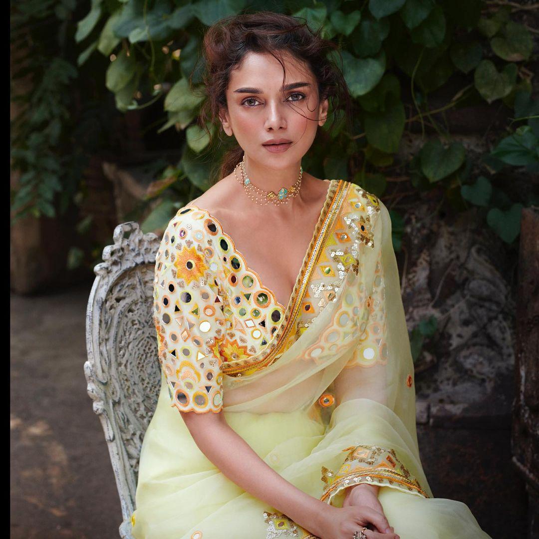 Sarees for win, in this look, Aditi wore a sheer lemon green saree, and oh god, the stunning blouse she paired it with has our heart